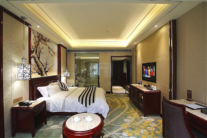 Imagen de la habitación del Hotel Jin Long Wan Hao. Foto 3