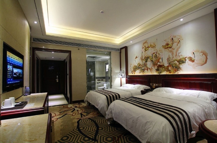 Imagen de la habitación del Hotel Jin Long Wan Hao. Foto 4
