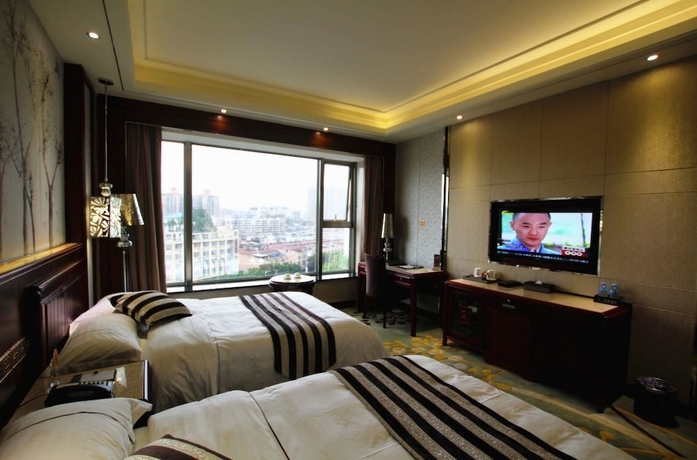 Imagen de la habitación del Hotel Jin Long Wan Hao. Foto 5