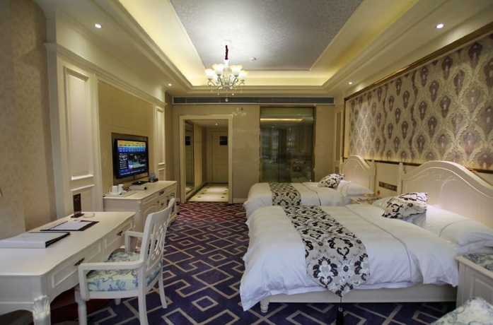 Imagen de la habitación del Hotel Jin Long Wan Hao. Foto 6
