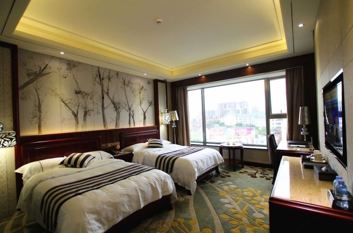 Imagen de la habitación del Hotel Jin Long Wan Hao. Foto 10