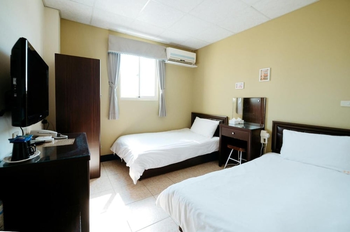 Imagen de la habitación del Hotel Jin Lu Homestay. Foto 15