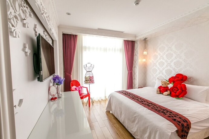 Imagen de la habitación del Hotel Jin Pin. Foto 17