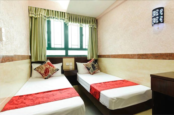 Imagen de la habitación del Hotel Jin Xiang. Foto 11