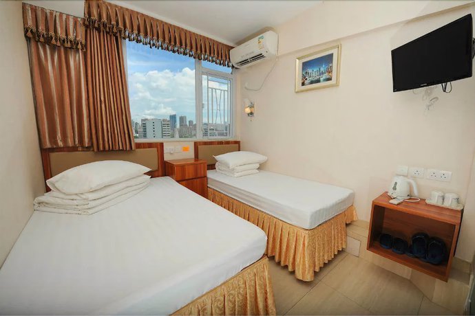 Imagen de la habitación del Hotel Jin Xiang. Foto 12