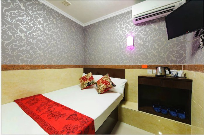 Imagen de la habitación del Hotel Jin Xiang. Foto 19