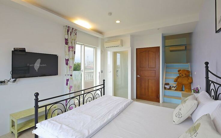 Imagen de la habitación del Hotel Jin Zhu Ya Bandb. Foto 17