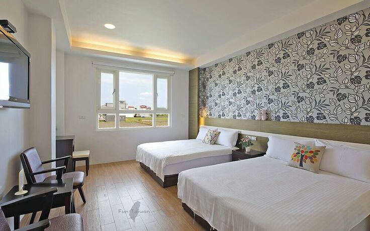 Imagen de la habitación del Hotel Jin Zhu Ya Bandb. Foto 23