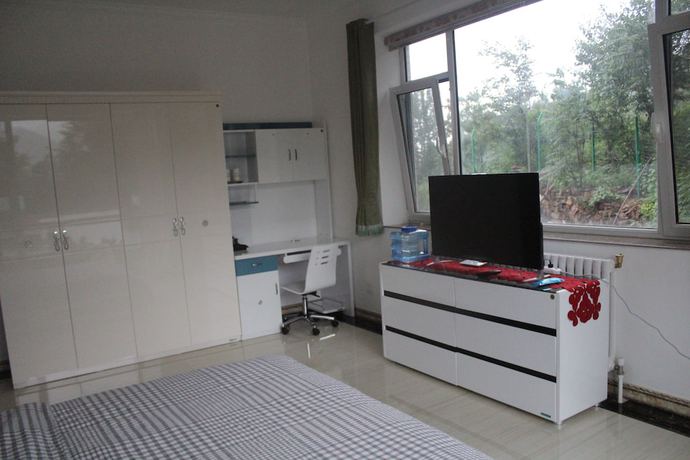 Imagen de la habitación del Hotel Jinan Banshan Linyun Resort Hotel. Foto 7