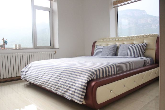 Imagen de la habitación del Hotel Jinan Banshan Linyun Resort Hotel. Foto 12