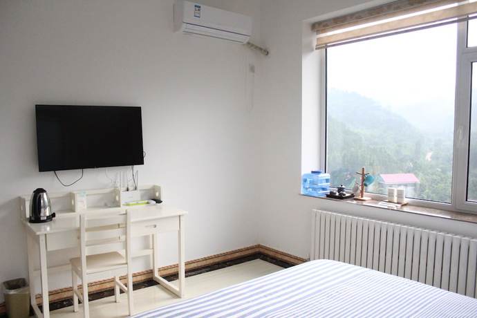 Imagen de la habitación del Hotel Jinan Banshan Linyun Resort Hotel. Foto 17