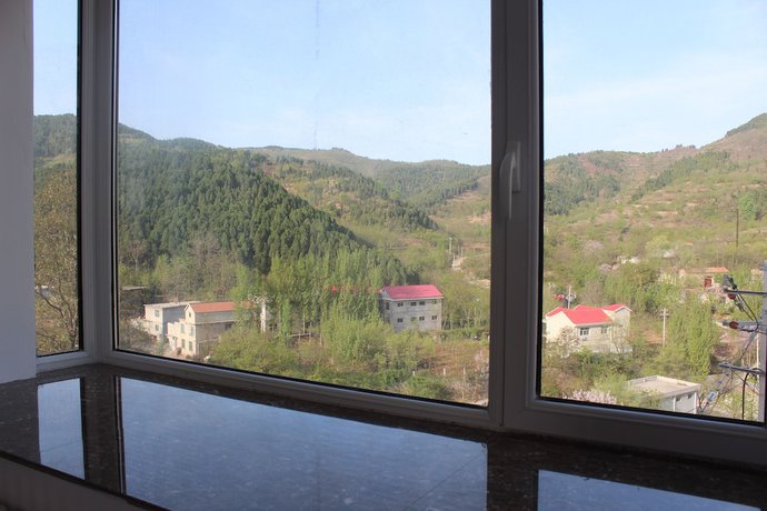 Imagen de la habitación del Hotel Jinan Banshan Linyun Resort Hotel. Foto 20