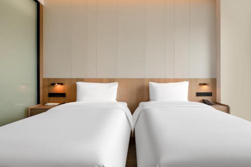 Imagen de la habitación del Hotel Jinan Zhonghai Kailu. Foto 17