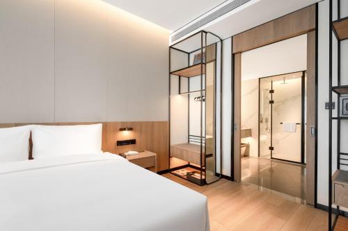 Imagen de la habitación del Hotel Jinan Zhonghai Kailu. Foto 18