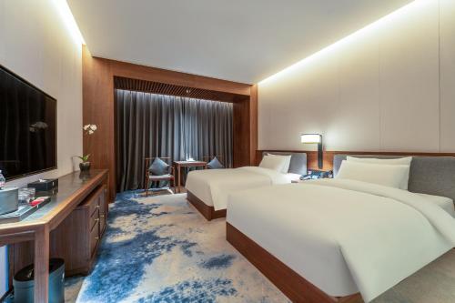 Imagen general del Hotel Jinan Ziyue Meixiu. Foto 2
