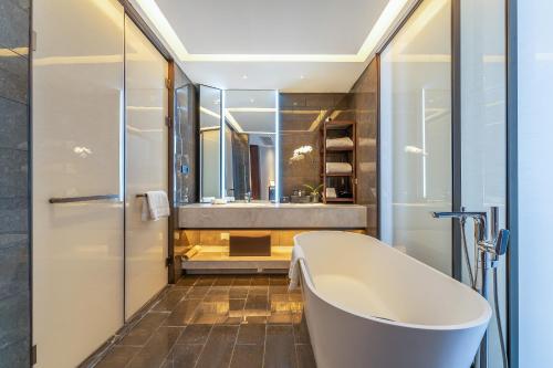Imagen de la habitación del Hotel Jinan Ziyue Meixiu. Foto 15