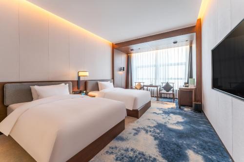 Imagen general del Hotel Jinan Ziyue Meixiu. Foto 8