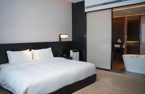 Imagen general del Hotel Jinan Ziyue Meixiu. Foto 12