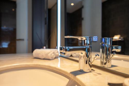 Imagen de la habitación del Hotel Jinan Ziyue Meixiu. Foto 19