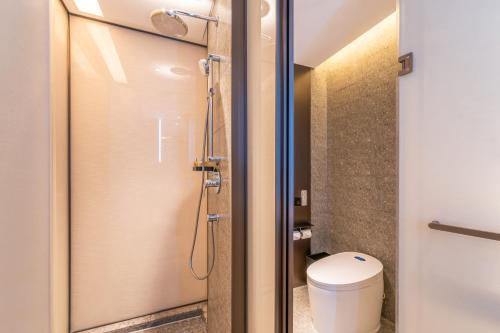 Imagen de la habitación del Hotel Jinan Ziyue Meixiu. Foto 20