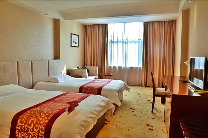 Imagen de la habitación del Hotel Jinbao Hotel Xiamen. Foto 18