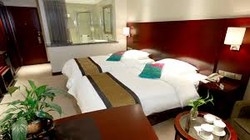 Imagen de la habitación del Hotel Jinbei Business Hotel. Foto 5