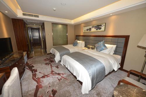 Imagen de la habitación del Hotel Jindu Jinyuan. Foto 7