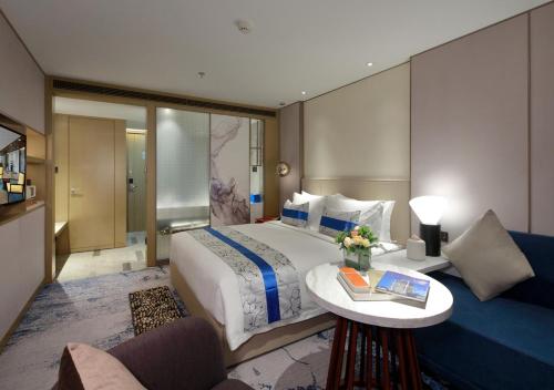 Imagen de la habitación del Hotel Jinfan Wanyuan. Foto 6