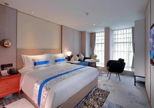 Imagen de la habitación del Hotel Jinfan Wanyuan. Foto 7