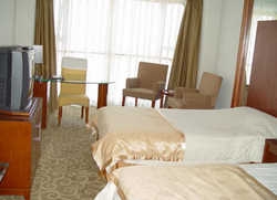 Imagen de la habitación del Hotel Jing Bin. Foto 4