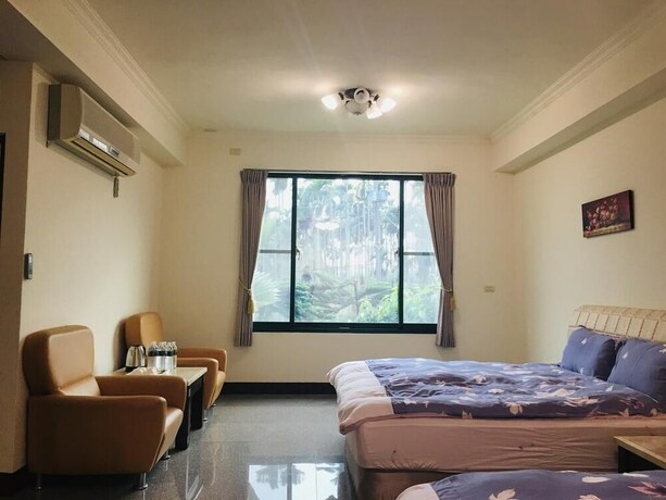 Imagen de la habitación del Hotel Jing Guan Yuan. Foto 17