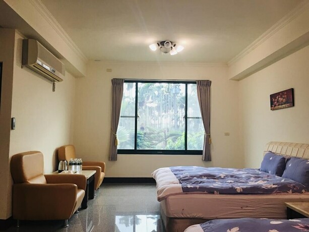 Imagen de la habitación del Hotel Jing Guan Yuan. Foto 26