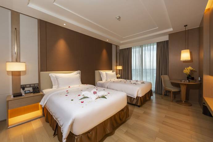 Imagen de la habitación del Hotel Jing Shang. Foto 12