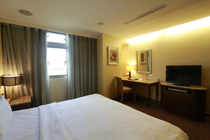 Imagen de la habitación del Hotel Jingan Classic Inn. Foto 14