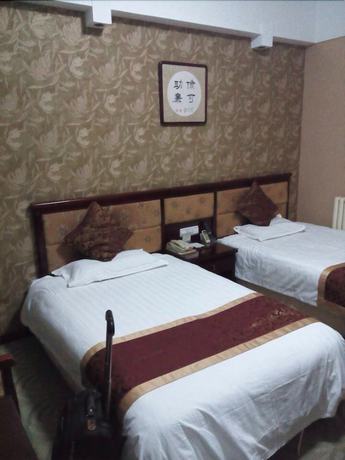 Imagen de la habitación del Hotel Jingangwan Hotel. Foto 5