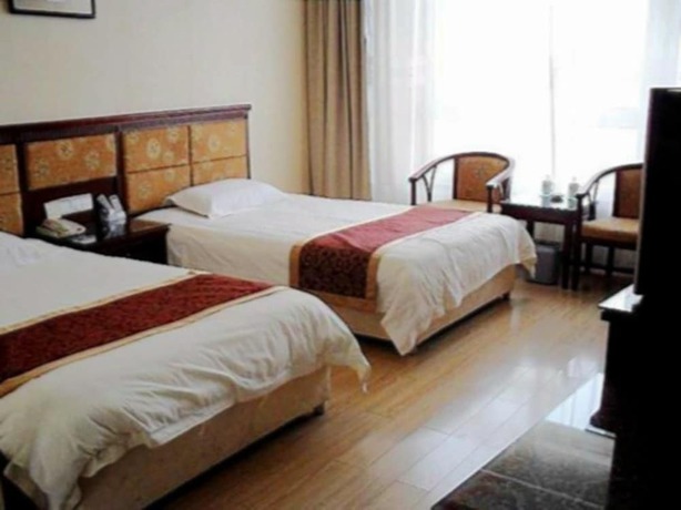 Imagen de la habitación del Hotel Jingangwan Hotel. Foto 11