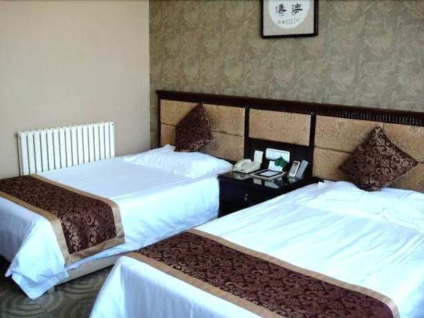 Imagen de la habitación del Hotel Jingangwan Hotel. Foto 14