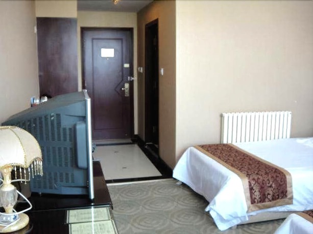 Imagen de la habitación del Hotel Jingangwan Hotel. Foto 15