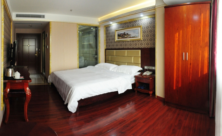 Imagen de la habitación del Hotel Jingdu. Foto 2