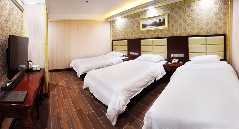 Imagen de la habitación del Hotel Jingdu. Foto 3