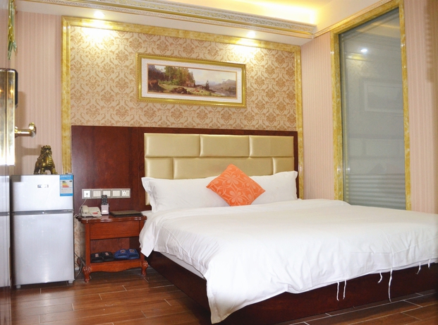 Imagen de la habitación del Hotel Jingdu. Foto 4