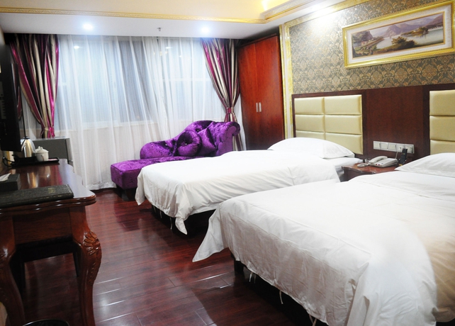 Imagen de la habitación del Hotel Jingdu. Foto 5