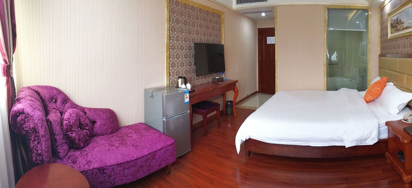 Imagen de la habitación del Hotel Jingdu. Foto 8