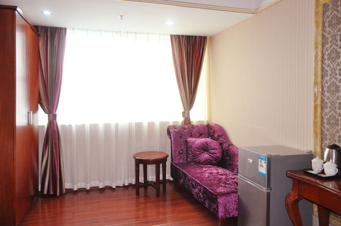 Imagen de la habitación del Hotel Jingdu. Foto 9