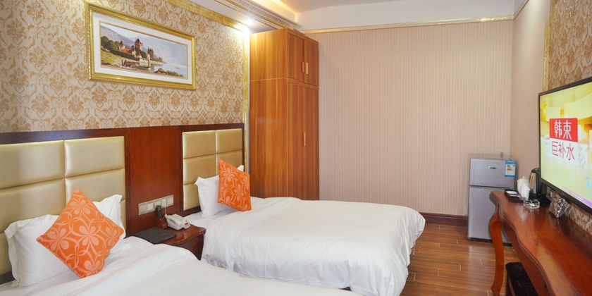 Imagen de la habitación del Hotel Jingdu. Foto 10