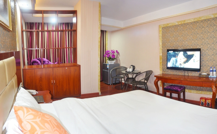 Imagen de la habitación del Hotel Jingdu. Foto 11