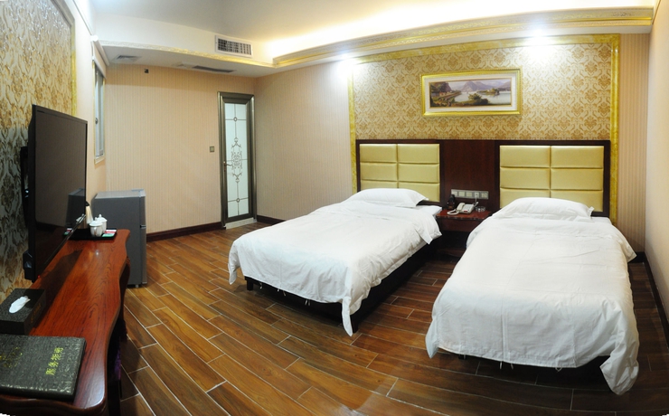 Imagen de la habitación del Hotel Jingdu. Foto 12