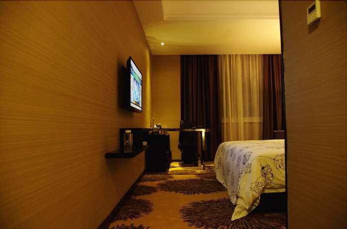 Imagen de la habitación del Hotel Jingduhui. Foto 3