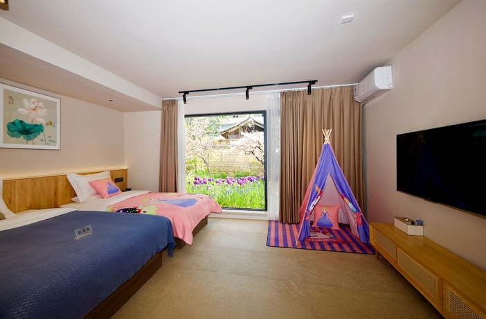 Imagen de la habitación del Hotel Jinghua Inn. Foto 10