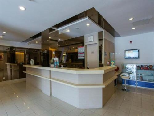 Imagen de la habitación del Hotel Jingjiang Inn Wuxi Liyuan Development Zone. Foto 6